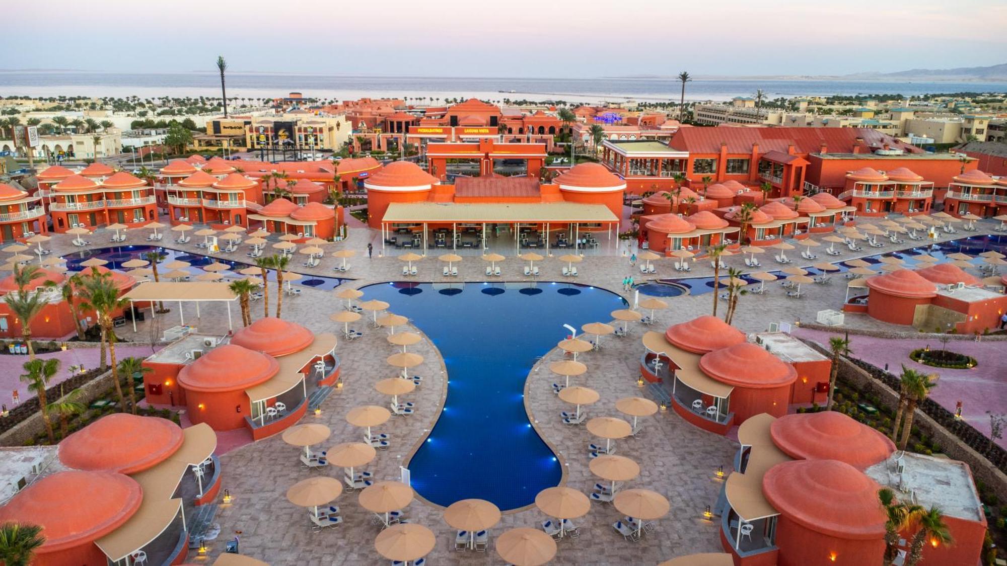 Pickalbatros Laguna Club Resort Sharm El Sheikh Zewnętrze zdjęcie The resort at sunset